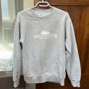 Grey TNA fleece sweatshirt, size small.